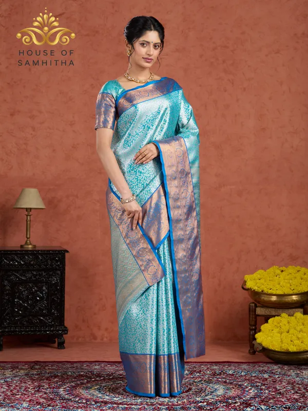 Aqua_Blue_Tissue_Brocade_Semi-Kanchi_Pattu_Saree_With_Royal_Blue_Contrast_Border