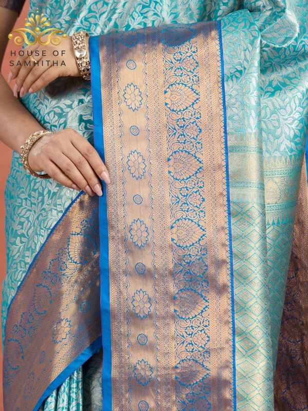 Aqua_Blue_Tissue_Brocade_Semi-Kanchi_Pattu_Saree_With_Royal_Blue_Contrast_Border