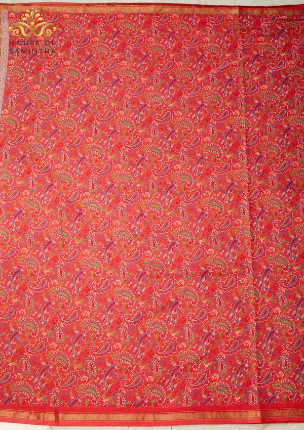 Radiant_Orange_Dola_Silk_Saree_Featuring_Multi-Color_Kalamkari_Paisley_Art_And_Zari_Border