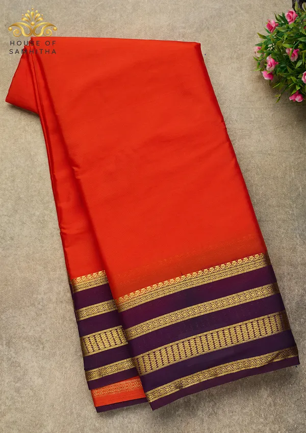 Radiant_Orange_Semi-Crape_Silk_Saree_Featuring_A_Contrast_Purple_And_Gold_Zari_Border