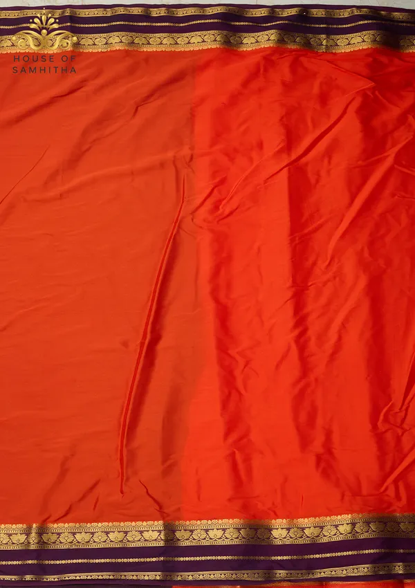 Radiant_Orange_Semi-Crape_Silk_Saree_Featuring_A_Contrast_Purple_And_Gold_Zari_Border