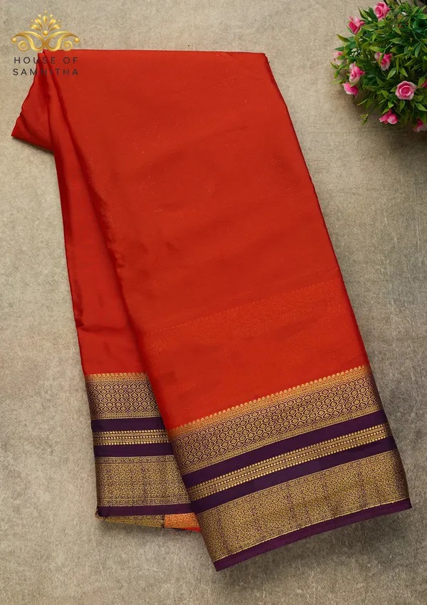 Radiant_Orange_Semi-Crape_Silk_Saree_Featuring_A_Contrast_Purple_And_Gold_Zari_Border