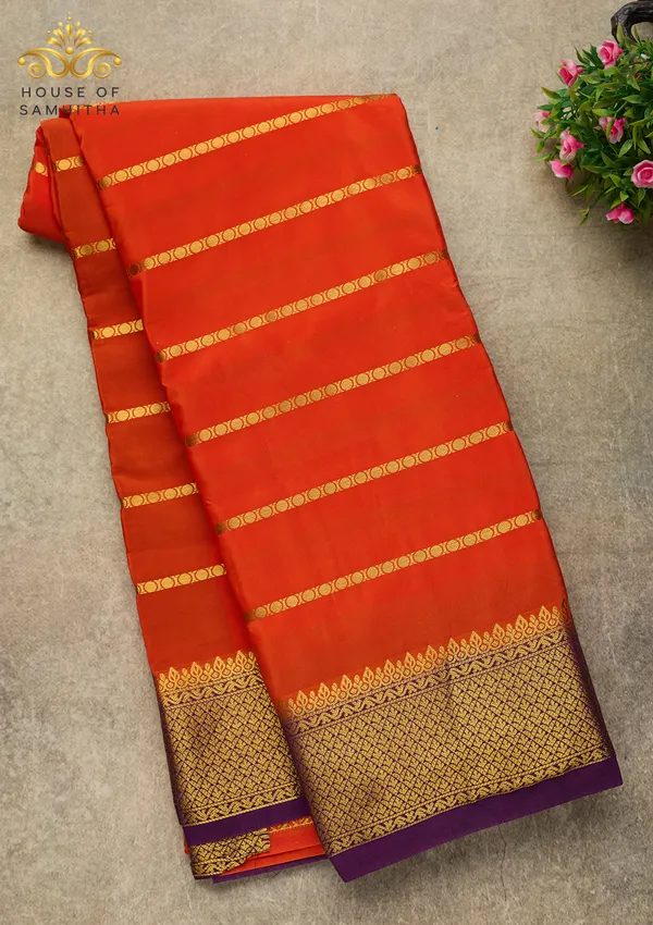 Radiant_Orange_Semi-Crepe_Silk_Saree_With_Horizontal_Zari_Stripes_And_Rich_Purple_Border