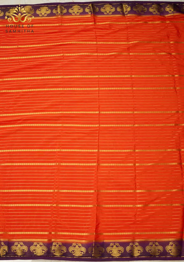 Radiant_Orange_Semi-Crepe_Silk_Saree_With_Horizontal_Zari_Stripes_And_Rich_Purple_Gandaberunda_Border