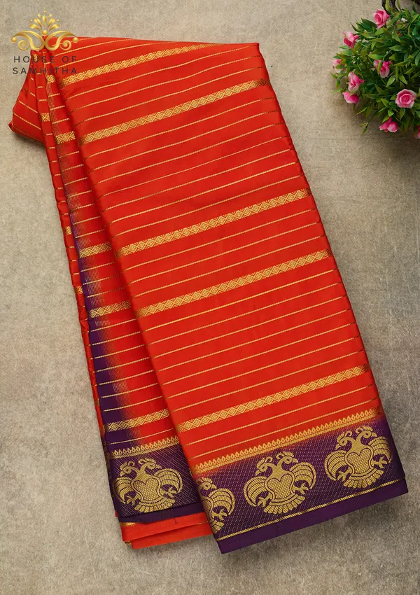 Radiant_Orange_Semi-Crepe_Silk_Saree_With_Horizontal_Zari_Stripes_And_Rich_Purple_Gandaberunda_Border