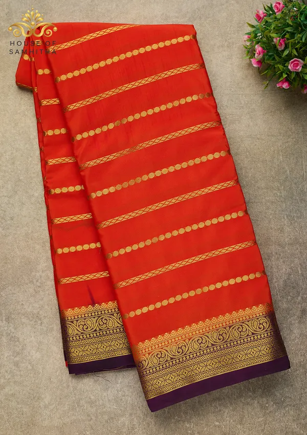 Radiant_Orange_Semi-Crepe_Silk_Saree_With_Horizontal_Zari_Stripes_And_Rich_Purple_Border