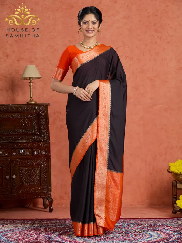 Elegant_Black_Saree_With_Contrast_Orange_Border