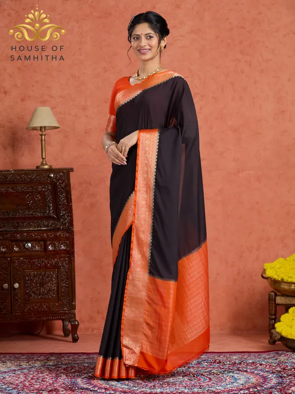 Elegant_Black_Saree_With_Contrast_Orange_Border
