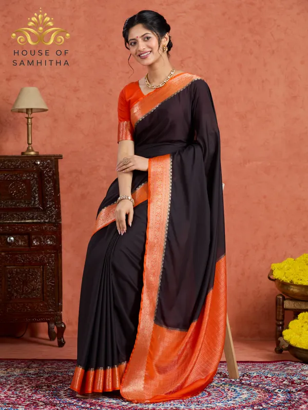 Elegant_Black_Saree_With_Contrast_Orange_Border