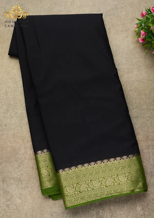 Timeless_Black_Semi-Crape_Silk_Saree_Featuring_A_Contrast_Mehendi_Green_Zari_Border