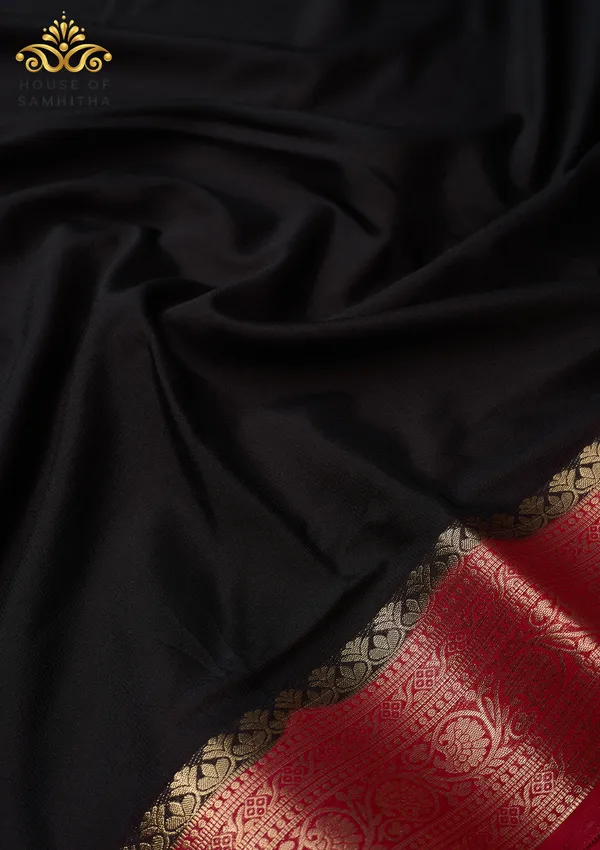 Timeless_Black_Semi-Crape_Silk_Saree_Featuring_A_Contrast_Cherry_Red_Zari_Border