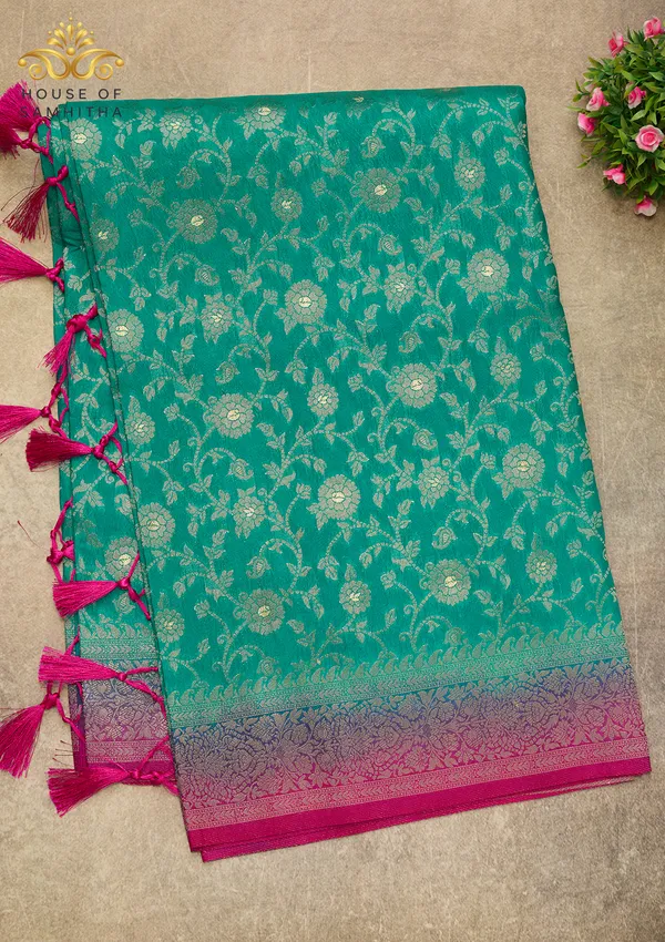Charming_Sea_Green_Banarasi_Imitation_Semi-Silk_Saree_With_Floral_Zari_Brocade_And_Contrast_Rani_Pink_Border
