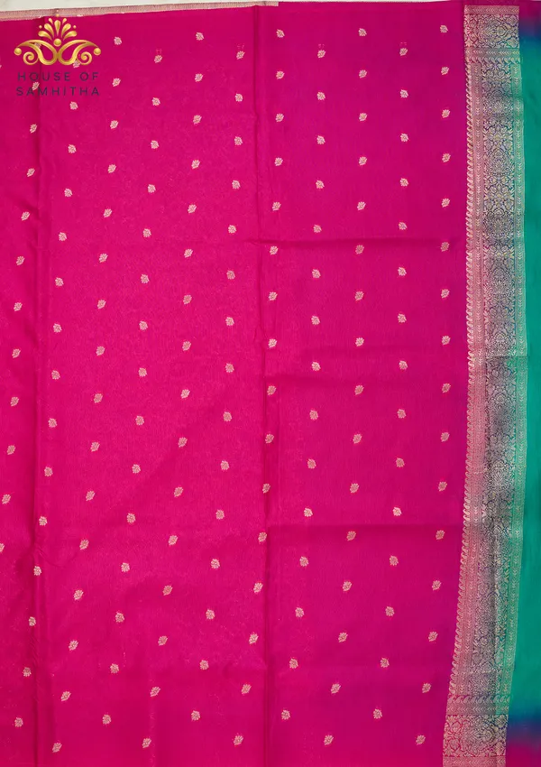 Charming_Sea_Green_Banarasi_Imitation_Semi-Silk_Saree_With_Floral_Zari_Brocade_And_Contrast_Rani_Pink_Border