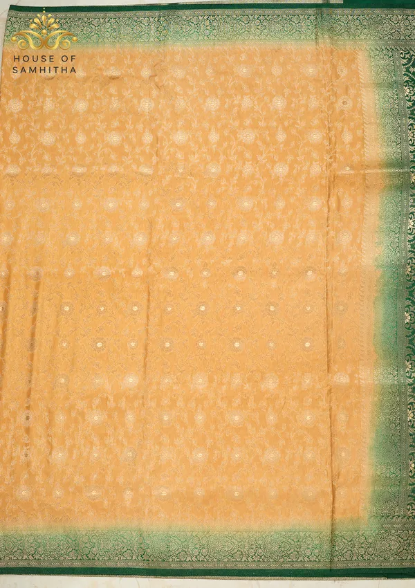 Majestic_Mustard_Gold_Banarasi_Imitation_Semi-Silk_Saree_With_Floral_Zari_Brocade_And_Contrast_Bottle_Green_Border
