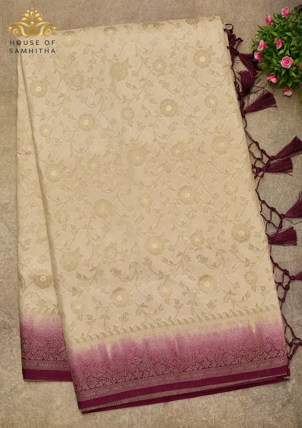 Elegant_Cream_Banarasi_Imitation_Semi-Silk_Saree_With_Floral_Zari_Brocade_And_Contrast_Magenta_Border