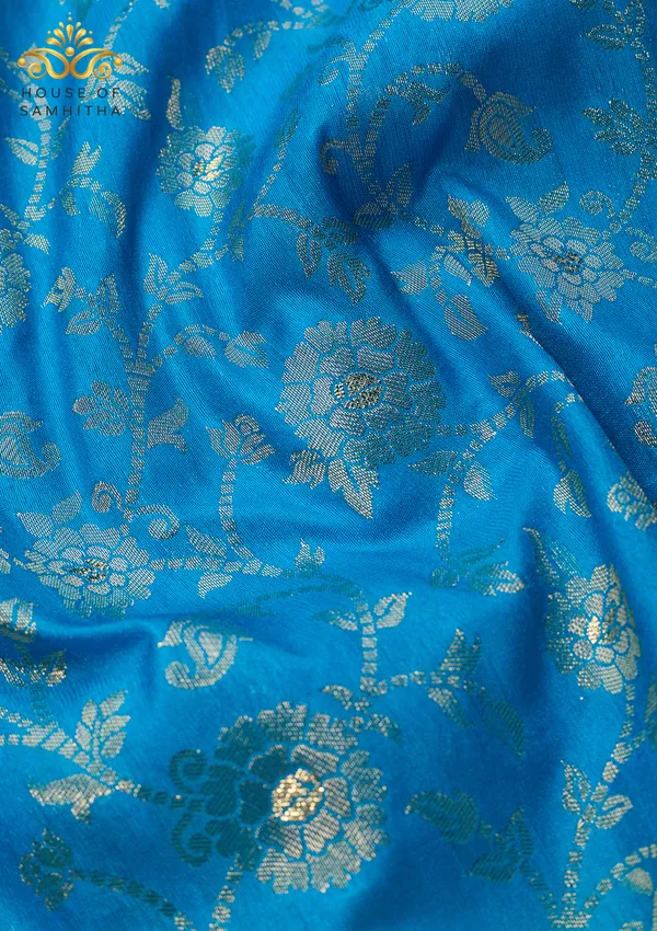 Radiant_Sky_Blue_Banarasi_Imitation_Semi-Silk_Saree_With_Floral_Zari_Brocade_And_Contrast_Magenta_Border