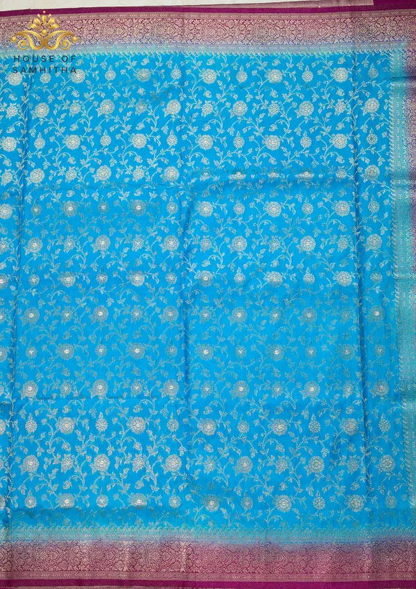 Radiant_Sky_Blue_Banarasi_Imitation_Semi-Silk_Saree_With_Floral_Zari_Brocade_And_Contrast_Magenta_Border