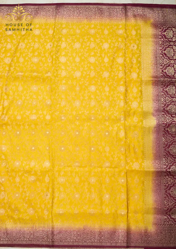 Radiant_Golden_Yellow_Banarasi_Imitation_Semi-Silk_Saree_With_Floral_Zari_Brocade_And_Contrast_Wine_Border