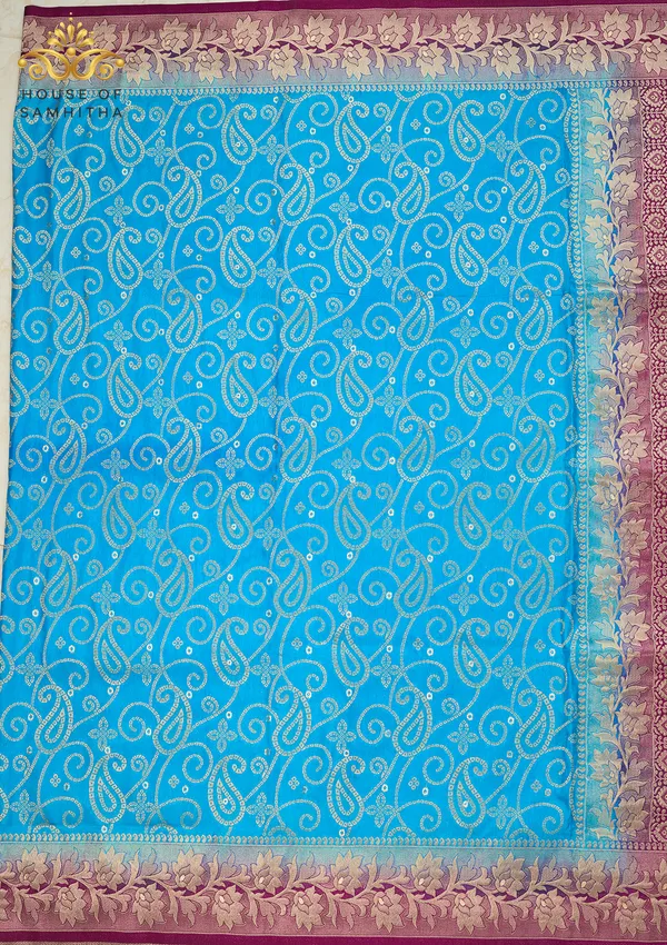 Radiant_Sky_Blue_Banarasi_Imitation_Semi-Silk_Saree_With_Floral_Zari_Brocade_And_Contrast_Magenta_Border