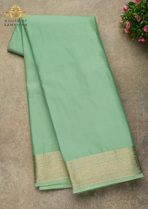 Elegant_Pista_Green_Semi-Crape_Saree_With_Traditional_Gold_Zari_Border