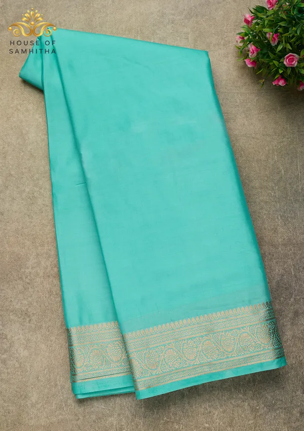 Elegant_Rama_Green_Semi-Crape_Saree_With_Traditional_Gold_Zari_Border