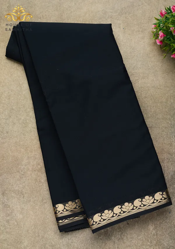Elegant_Black_Semi-Crape_Saree_With_Lotus_And_Paisley_Gold_Zari_Border