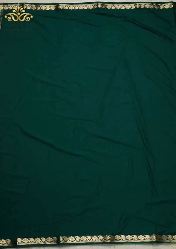Regal_Bottle_Green_Semi-Crape_Saree_With_Lotus_And_Paisley_Gold_Zari_Border