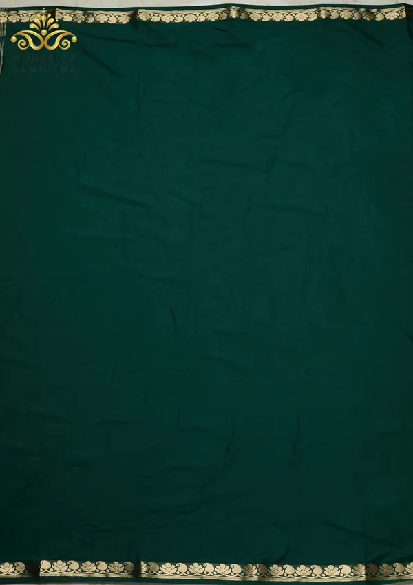 Regal_Bottle_Green_Semi-Crape_Saree_With_Lotus_And_Paisley_Gold_Zari_Border