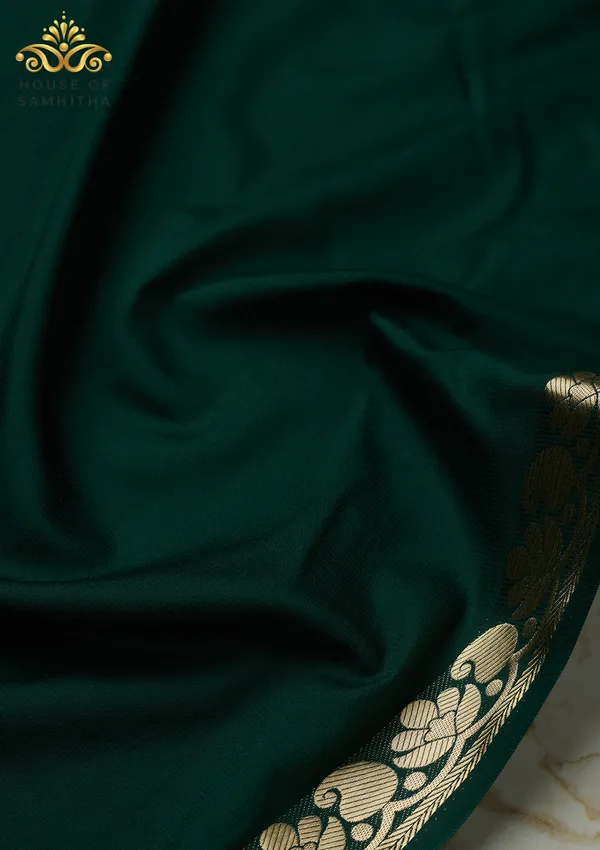 Regal_Bottle_Green_Semi-Crape_Saree_With_Lotus_And_Paisley_Gold_Zari_Border