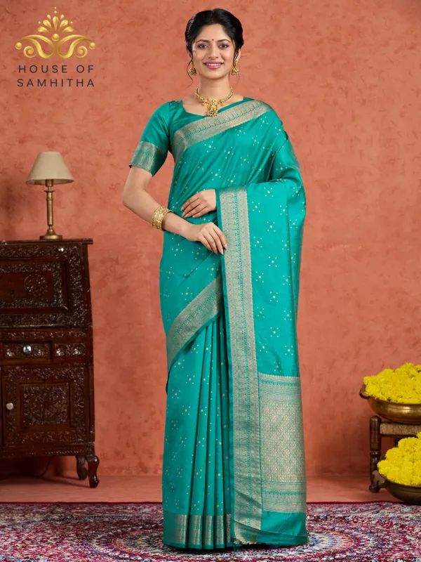 Regal_Rama_Green_Semi-Kanchi_Pattu_Saree_With_Gold_Zari_Butas_And_Traditional_Brocade_Border