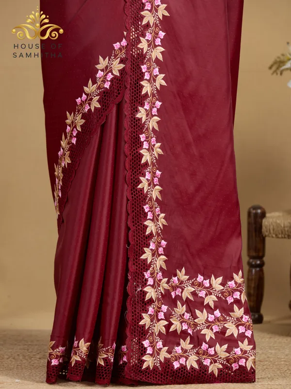 Exquisite_Deep_Maroon_Zara_Silk_Saree_With_Delicate_Floral_Embroidery_And_Designer_Cutwork_Border