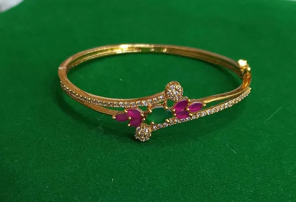 Golden_Ruby_And_Emerald_Studded_Gold_Plated_Metal_Openable_Bracelet_For_Women