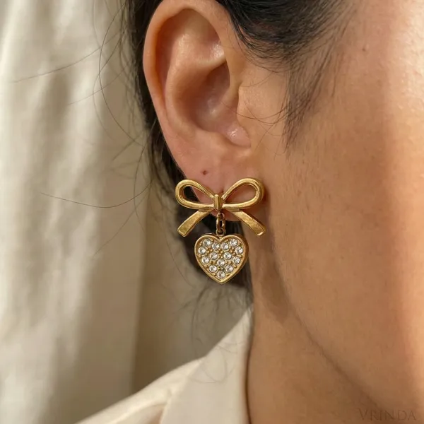 Gold_Plated_22_K_Bow_Studs_With_Crystal_Heart_Drop