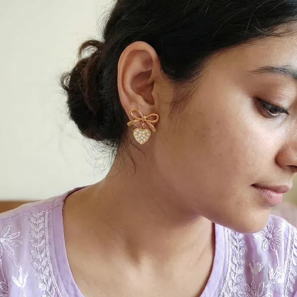 Gold_Plated_22_K_Bow_Studs_With_Crystal_Heart_Drop