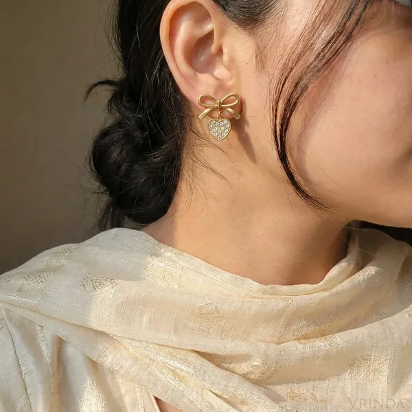 Gold_Plated_22_K_Bow_Studs_With_Crystal_Heart_Drop