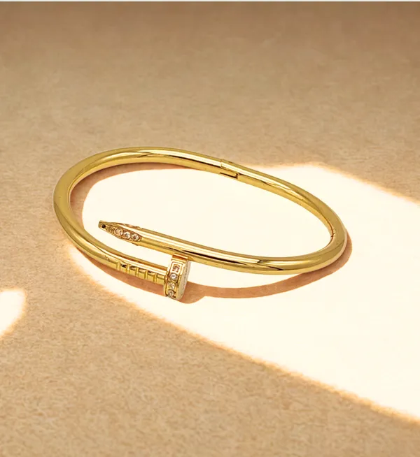 Gold_Plated_Stainless_Steel_Nail_Design_Bracelet_With_Stone_For_Women