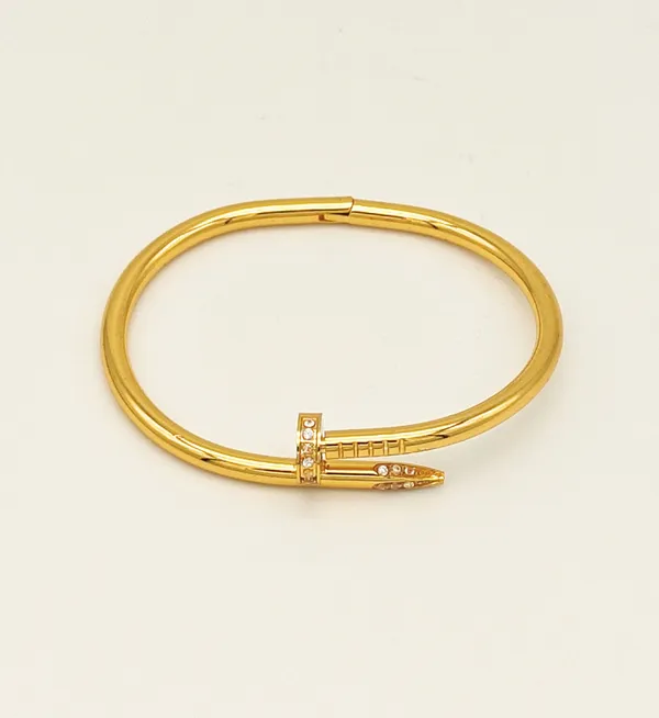 Gold_Plated_Stainless_Steel_Nail_Design_Bracelet_With_Stone_For_Women