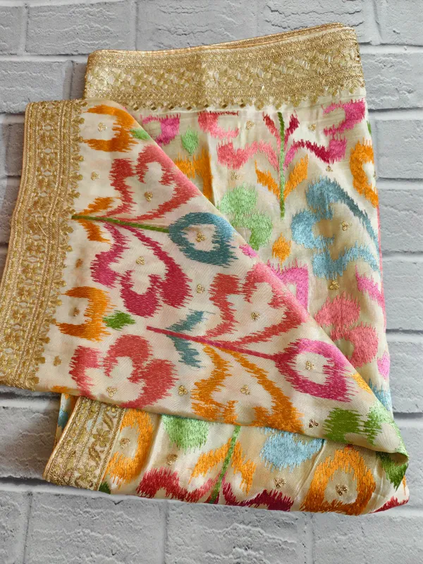 Cream_Chinon_Silk_Dupatta_With_Multicolor_Ikat_Style_Embroidery_Zari_Border