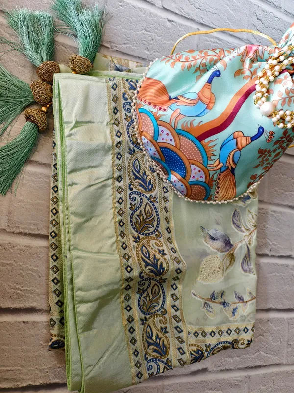 Combo_Mint_Melody__Brasso_Floral_Dupatta_With_Gold_Jacquard_Border_Printed_Peacock_Potli