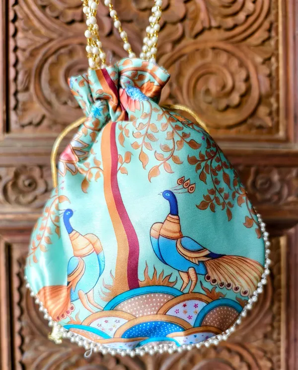 Combo_Mint_Melody__Brasso_Floral_Dupatta_With_Gold_Jacquard_Border_Printed_Peacock_Potli