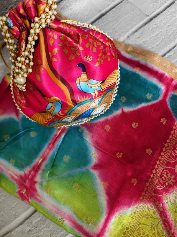 Combo_Luxury_Mint_Banarasi_Woven_Dupatta_Peacock_Print_Potli_Bag_Combo