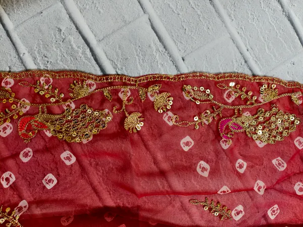 Multi_toned_Bandhej_Dupatta_with_peacock_Zari_work