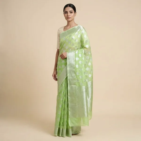 Green_Banarasi_With_Silver_Zari_Buti_Work_And_Woven_Border_Silk_Saree_For_Women
