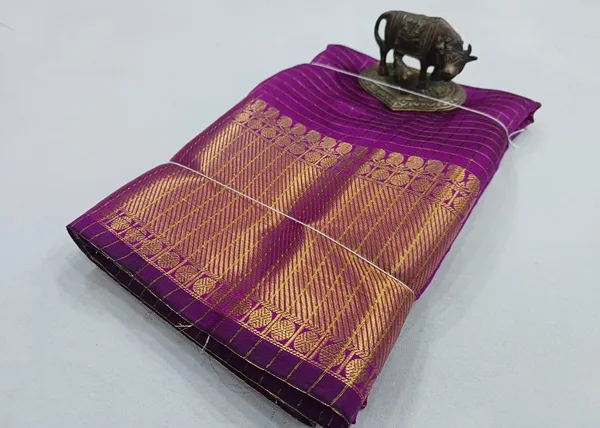 Purple_With_Golden_Zari_Border_And_Traditional_Design_Silk_Saree_For_Women