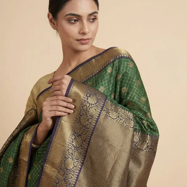 Green_With_Gold_Zari_Work_And_Traditional_Border_Silk_Saree_For_Women