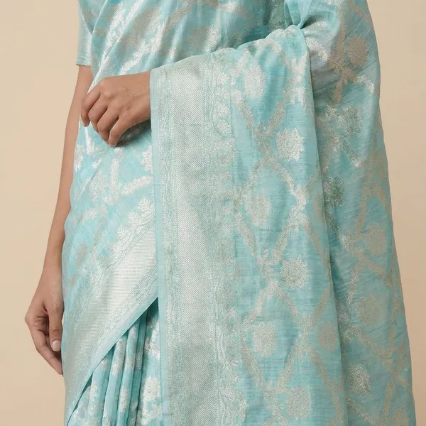 Turquoise_Blue_And_Silver_Floral_Brocade_Fabric_Silk_Saree_For_Women