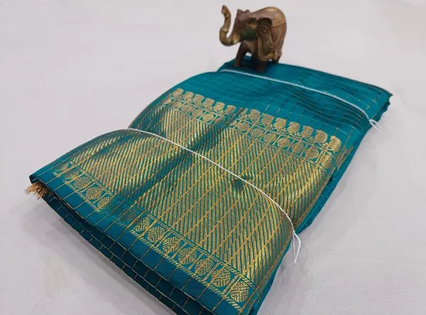 Teal_Blue_Kanchipuram_With_Golden_Zari_Border_And_Elephant_Motifs_Silk_Saree_For_Women