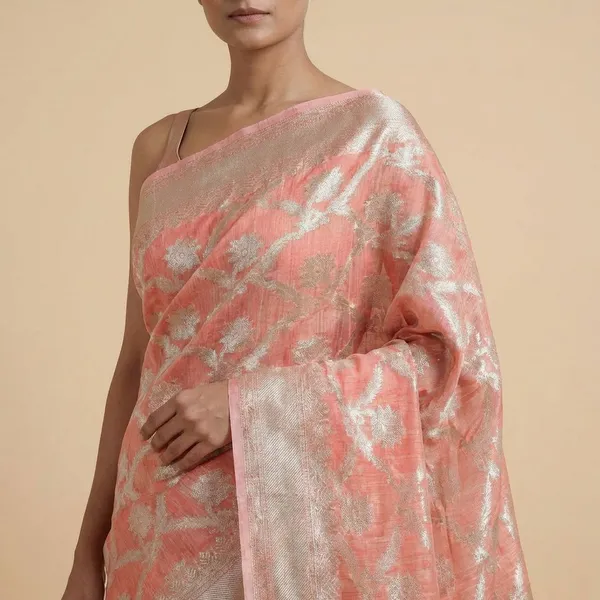Peach_Pink_Elegant_Floral_Brocade_Fabric_With_Silver_Zari_Border_Silk_Saree_For_Women