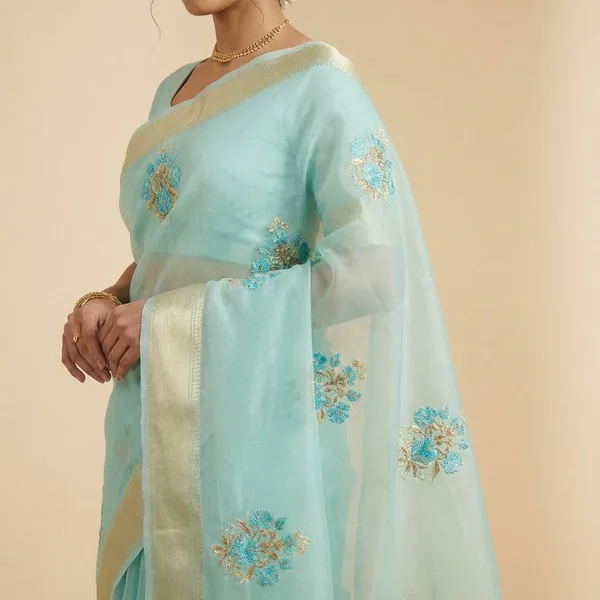 Sky_Blue_Elegant_Organza_With_Floral_Embroidery_And_Golden_Border_Silk_Saree_For_Women
