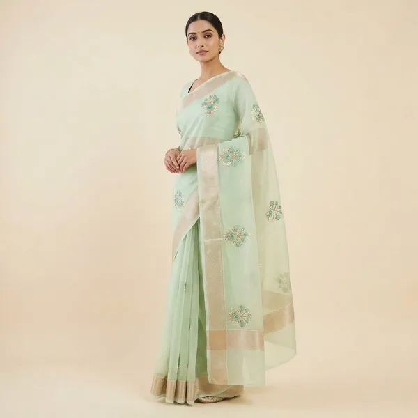 Mint_Green_Organza_With_Embroidered_Floral_Motifs_And_Golden_Border_Silk_Saree_For_Women